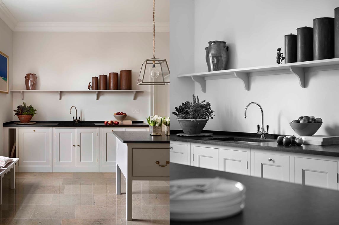 White wooden Lodge kitchen with black stone work surfaces