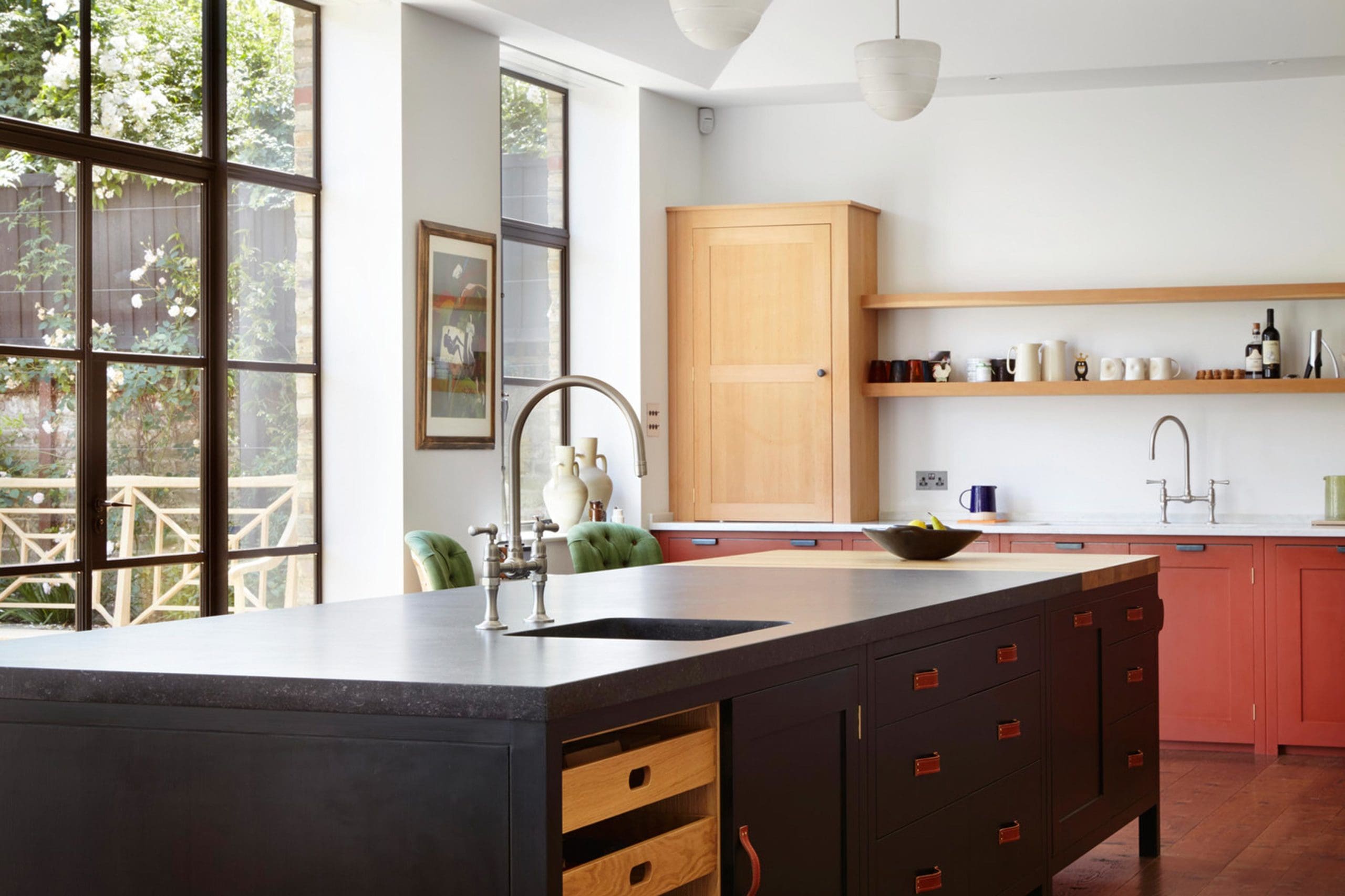  Dark grey kitchen island with victorian tap